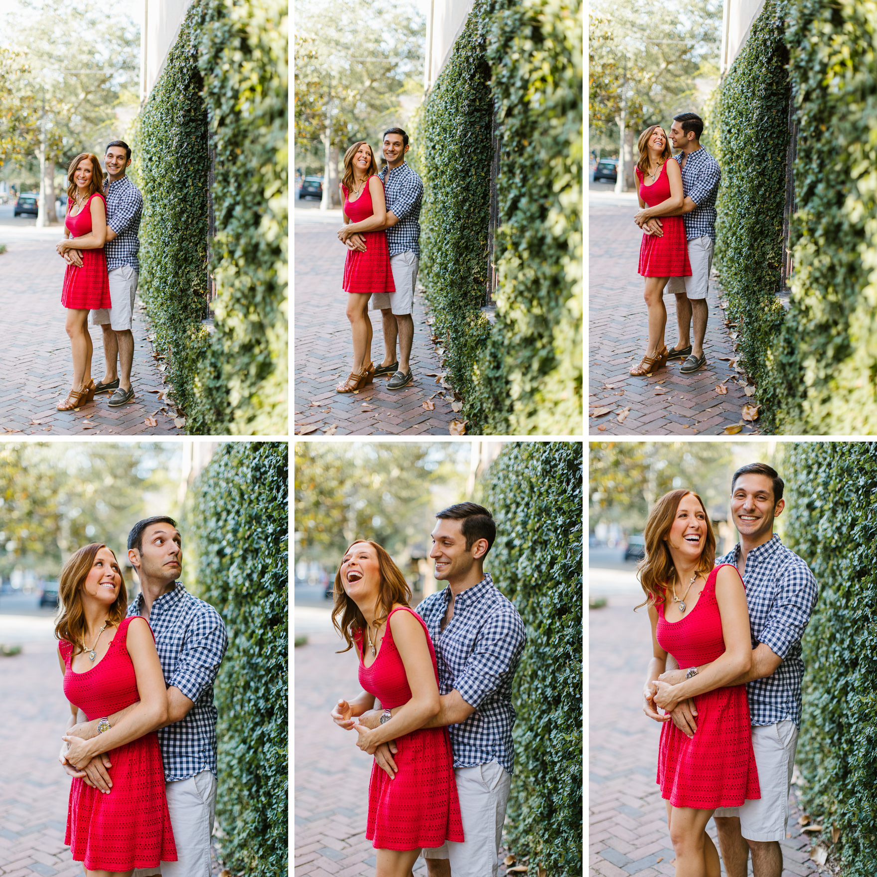 Couple standing on brick street with ivy covered wall
